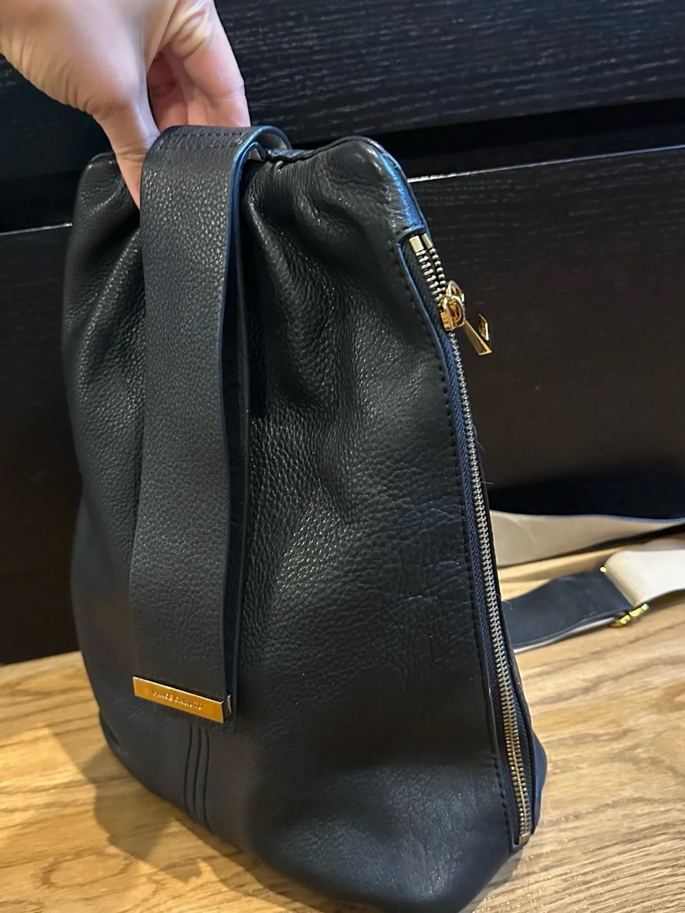 Vince Camuto Black Leather sling Backpack with Gold Accent